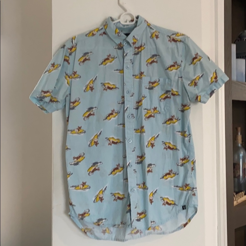 Dress shirt printed corgis riding a surfboard.